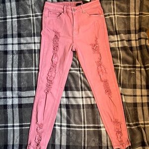 Pink ballet slipper color pants and they are stretchy, size 7/28